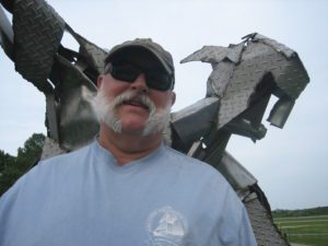 miCRo: “Compensation” by Ken Poyner