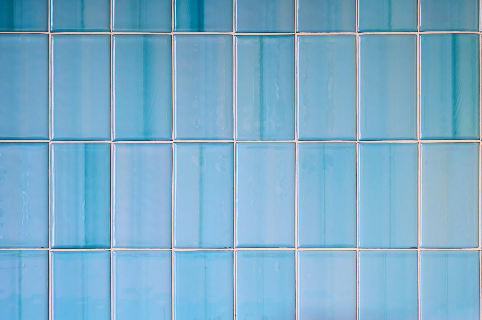 A blue tiled wall.