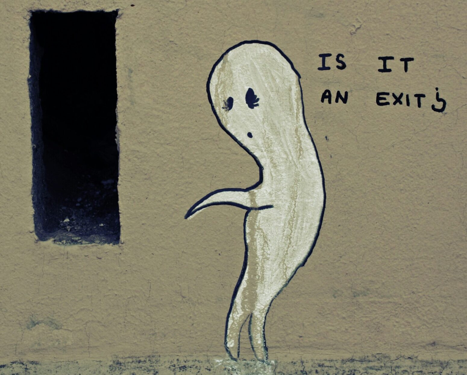 A ghost ponders a spot on the wall that is possibly a window or portal. Off to the side there is a question painted on the wall: "Is it an Exit?"