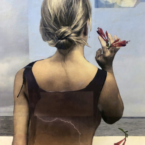 The back of a swimsuit-clad female figure with blond hair pulled back into a knot at the nape of her neck is superimposed on a beach looking out at the water. A flower is superimposed into her hand and tumbling from her grip. A hummingbird is superimposed above and to the right of her head. Layered within her dark swimsuit is the image of a lightning bolt crossing the sky.