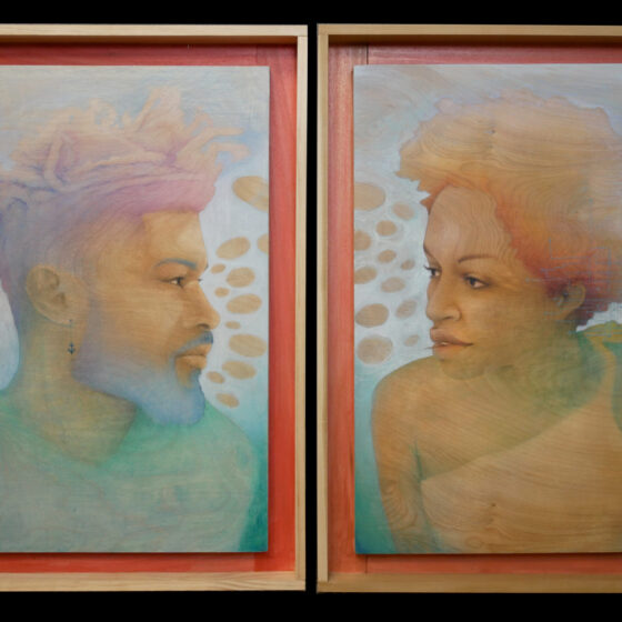 Two wooden frame that hold two paintings surrounded by a red border. On the left, a black man with a blue beard and blue-and-purple locs looks to the right. He wears a teal shirt. On the right, a black woman with a red-and-orange afro looks to the left. She wears an asymmetric, orange shirt. The background of both paintings is blue with gray ellipses near their faces.