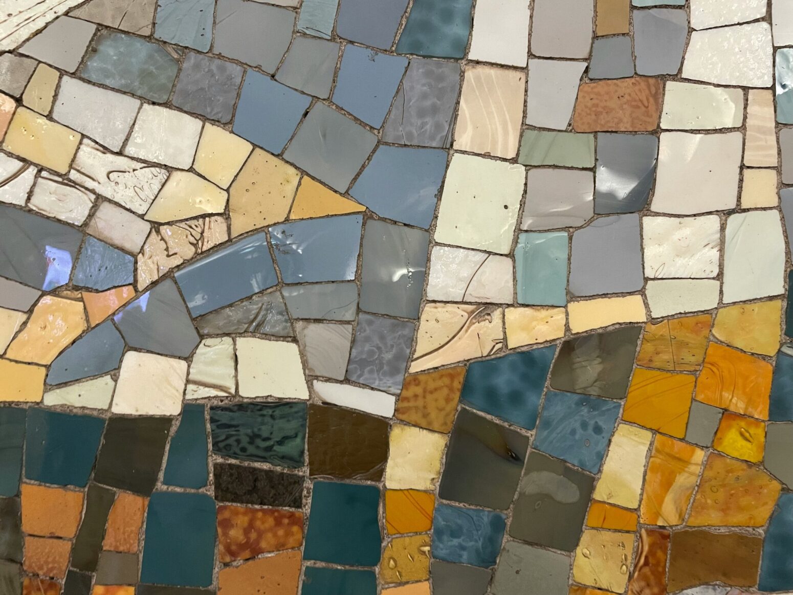 White, blue, and yellow mosaic tiles.