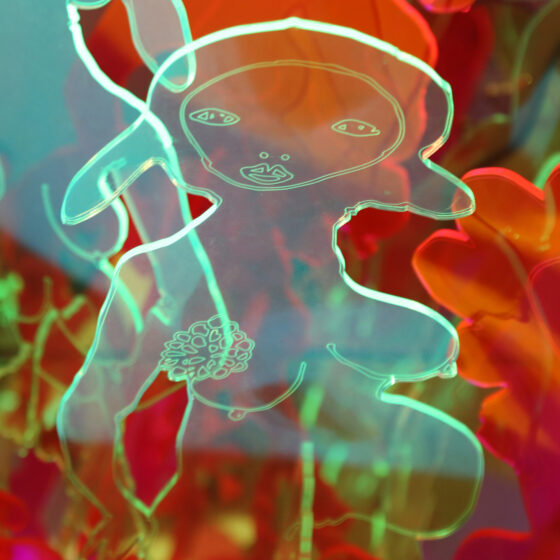 Multiple acrylic cut-outs of naked, pregnant women, the most prominent of which being turquoise with a small nose, lips, and two far-apart eyes.