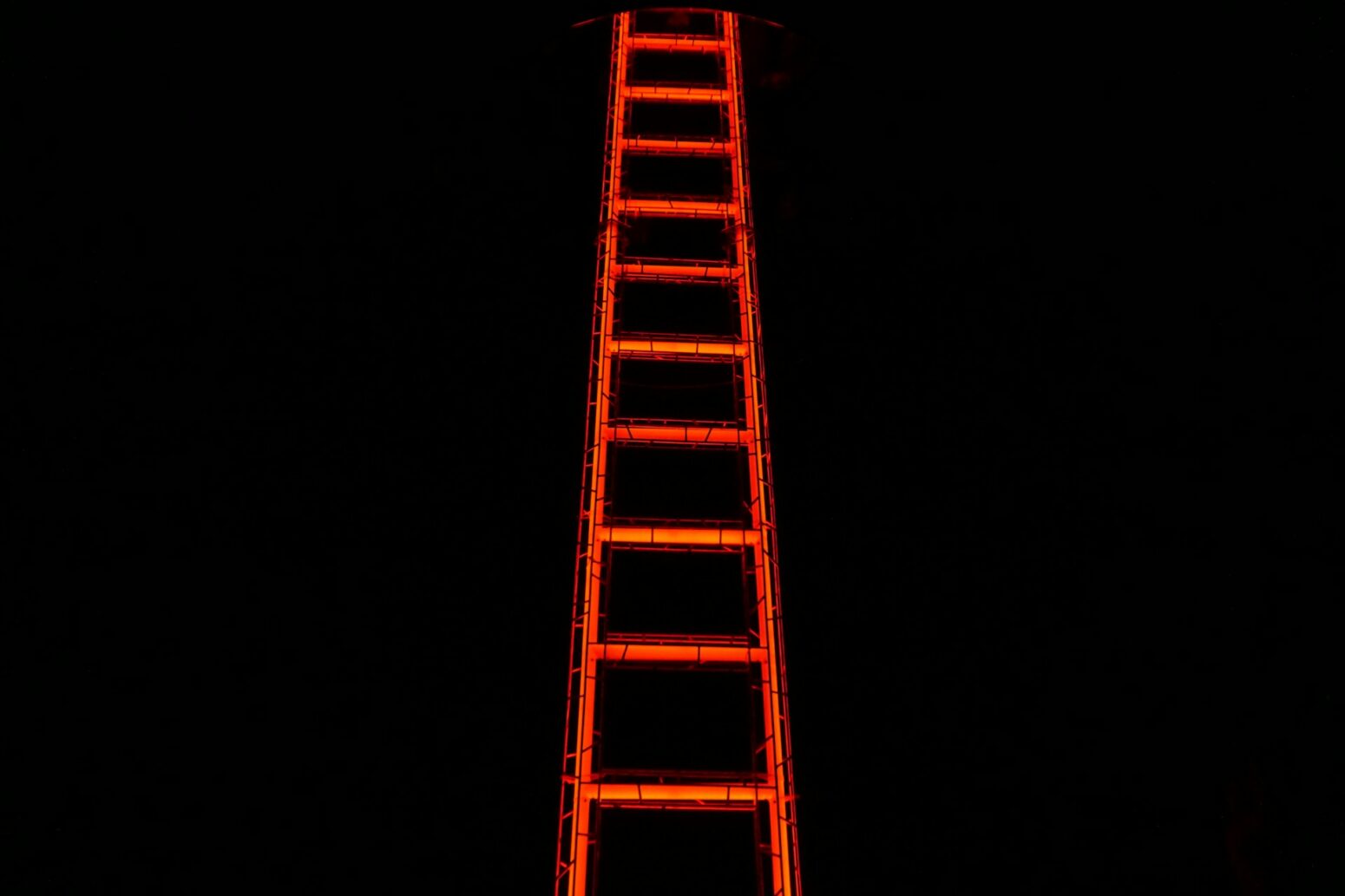 A red neon ladder