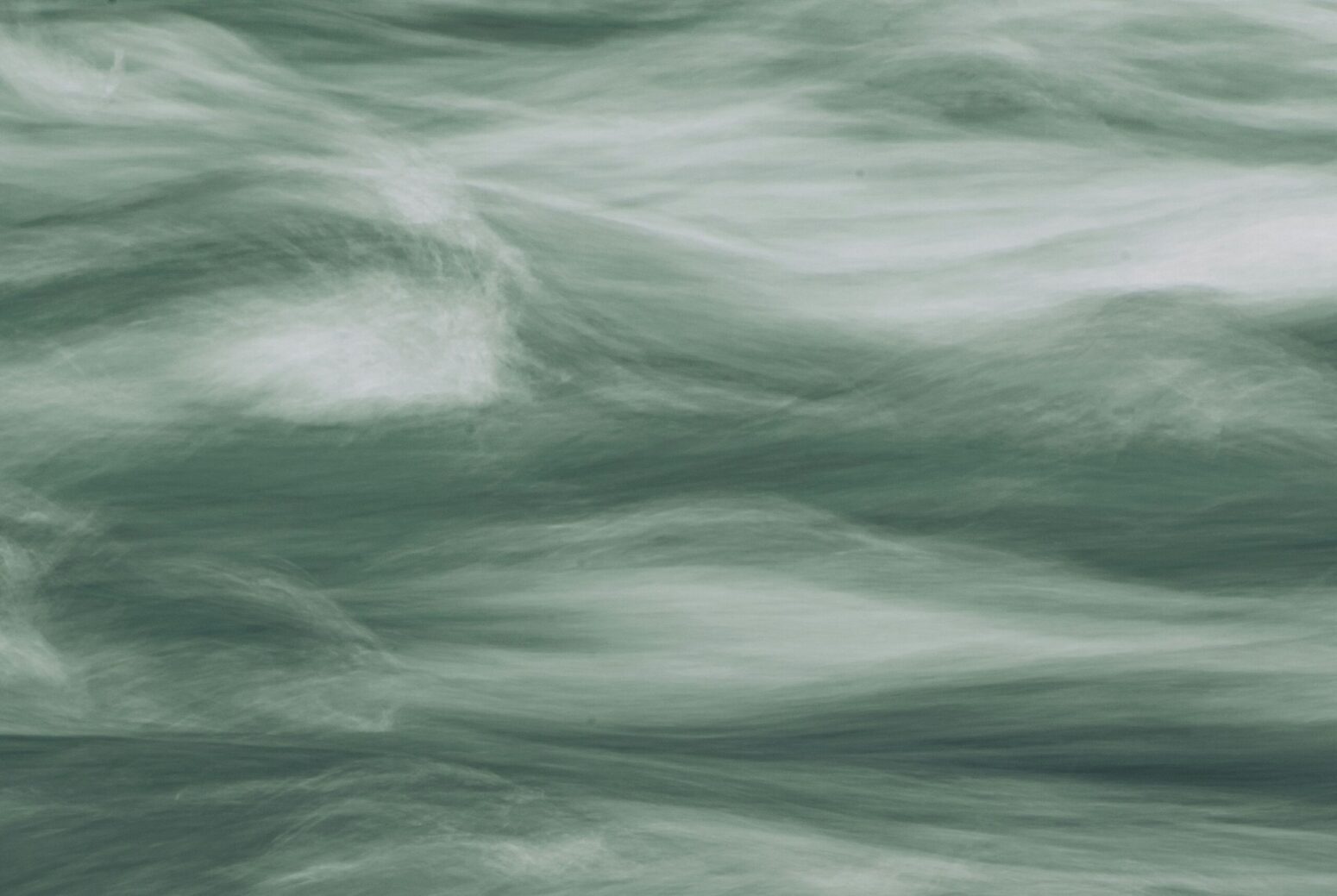 White, flowing fog on a gray background