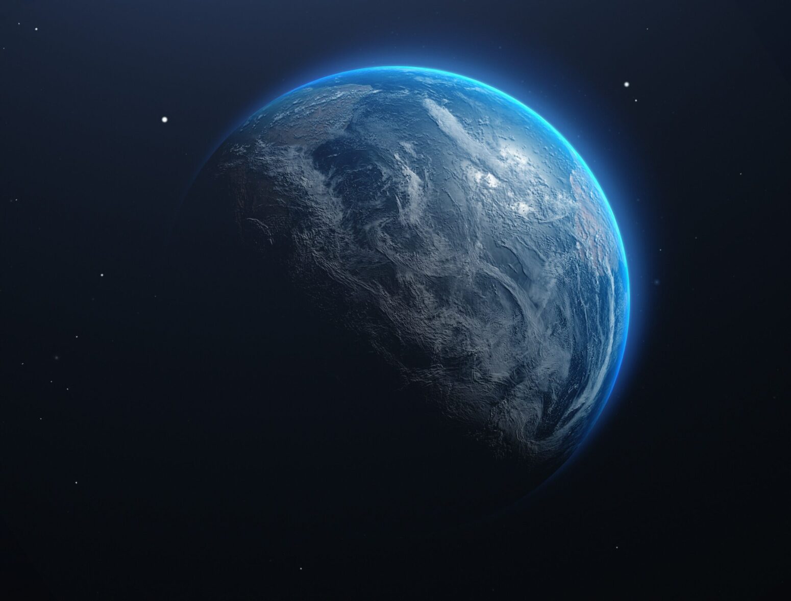 This photograph shows the view of Earth from space. There are blue hues with the moon covering half of the Earth.