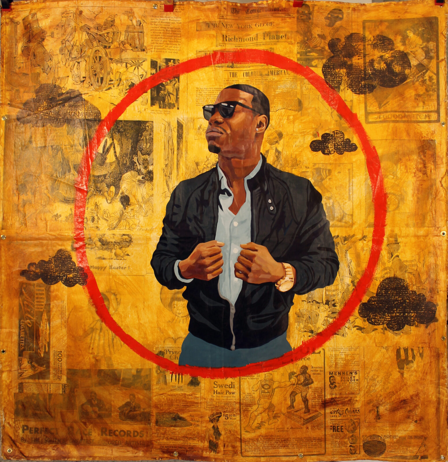 This artwork shows a man with sunglasses, hands clenching the middle of his black suit, looking towards something. There is a red circle painted around him, with articles of newspapers scattered across in the background, with a variety of images being shown. He is wearing blue jeans and a blue button-up shirt underneath, in addition to a gold watch.