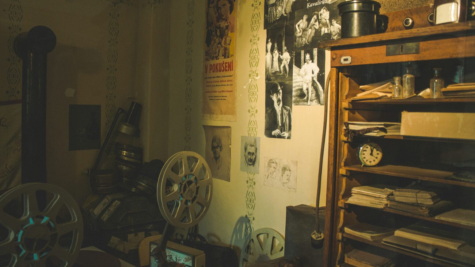 This photograph shows a room with many things visible, painted in a yellow light.