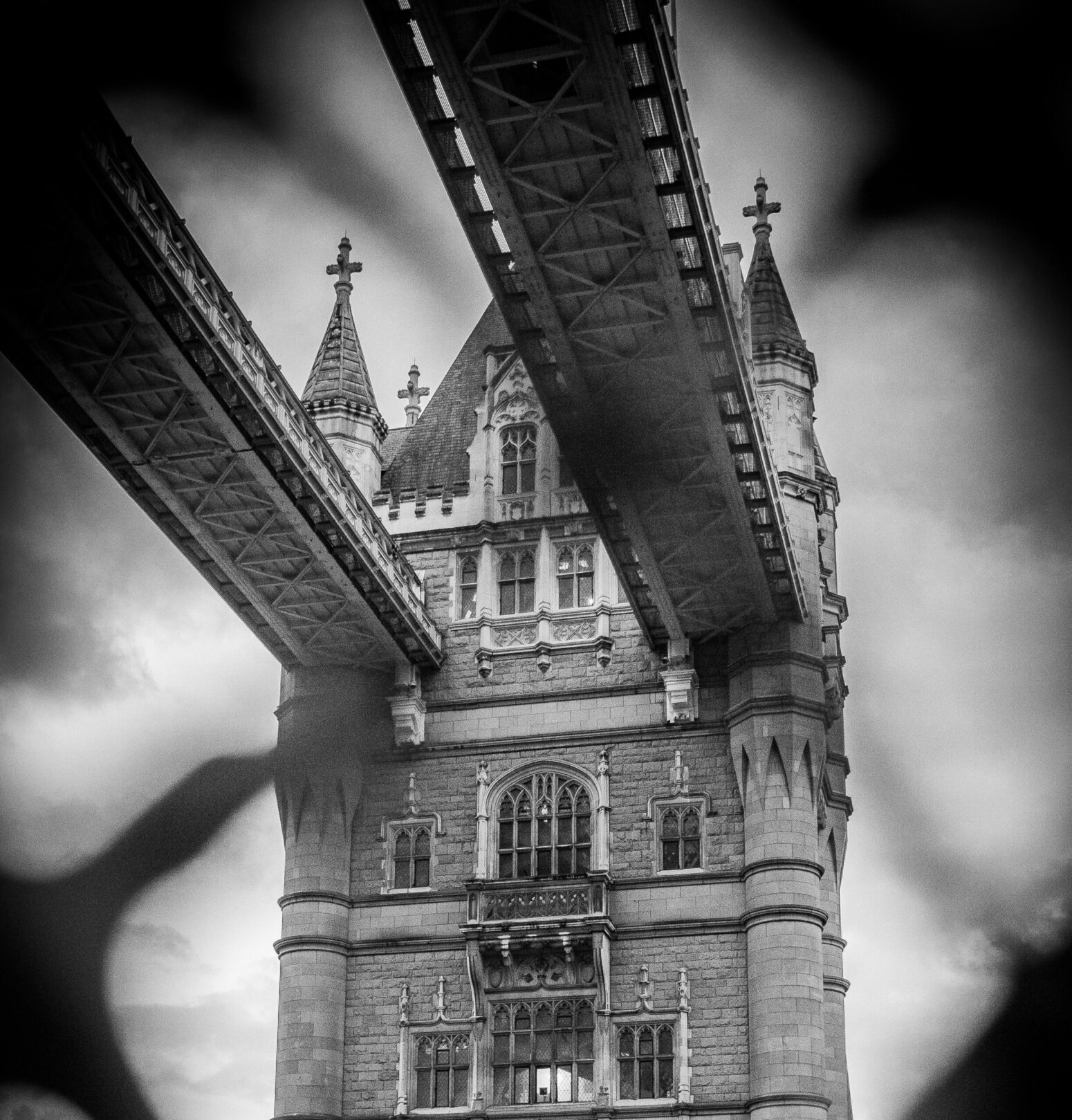 Tower Bridge London through a blurred wired fence