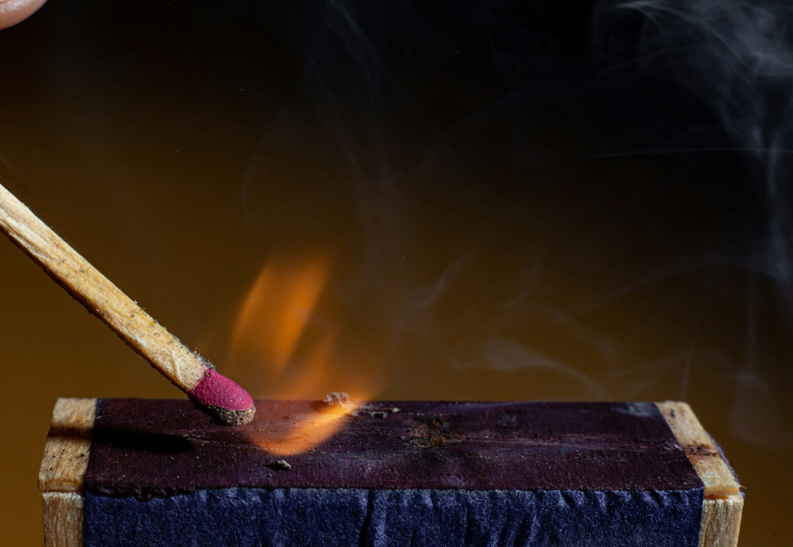 A match being struck and catching fire